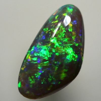 SOLID BLACK OPAL Sparkling bright greens and orange in a 3D pattern